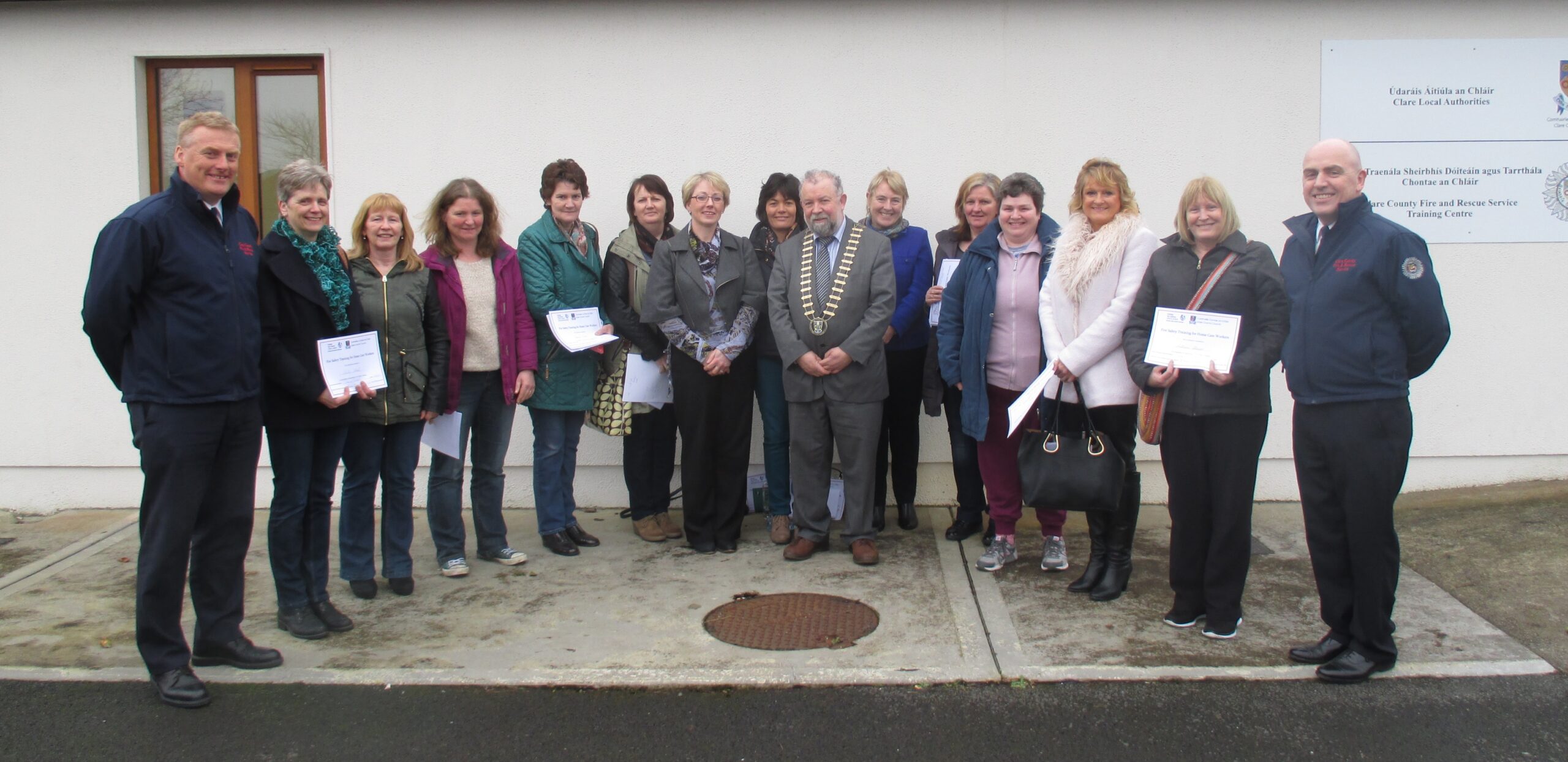 Family Carers and staff from Caring for Carers Ireland (CFCI) and members of Clare County Fire & Rescue Service pictured with Cllr. John Crowe, Cathaoirleach of Clare County Council (centre) at the Clare County Fire and Rescue Service Training Centre in Ennis on Saturday.